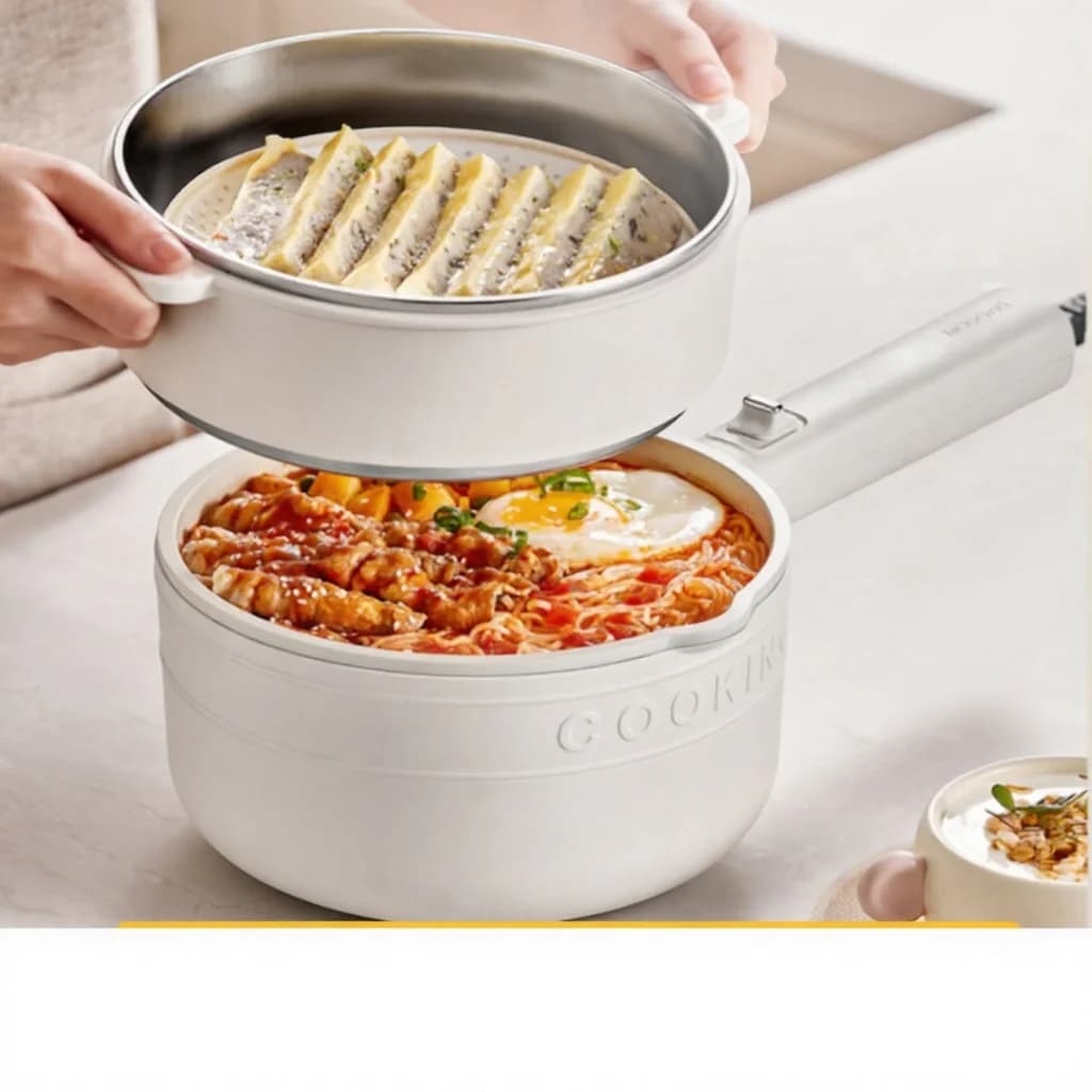 Nồi nấu điện có lòng phủ men sứ và xửng hấp