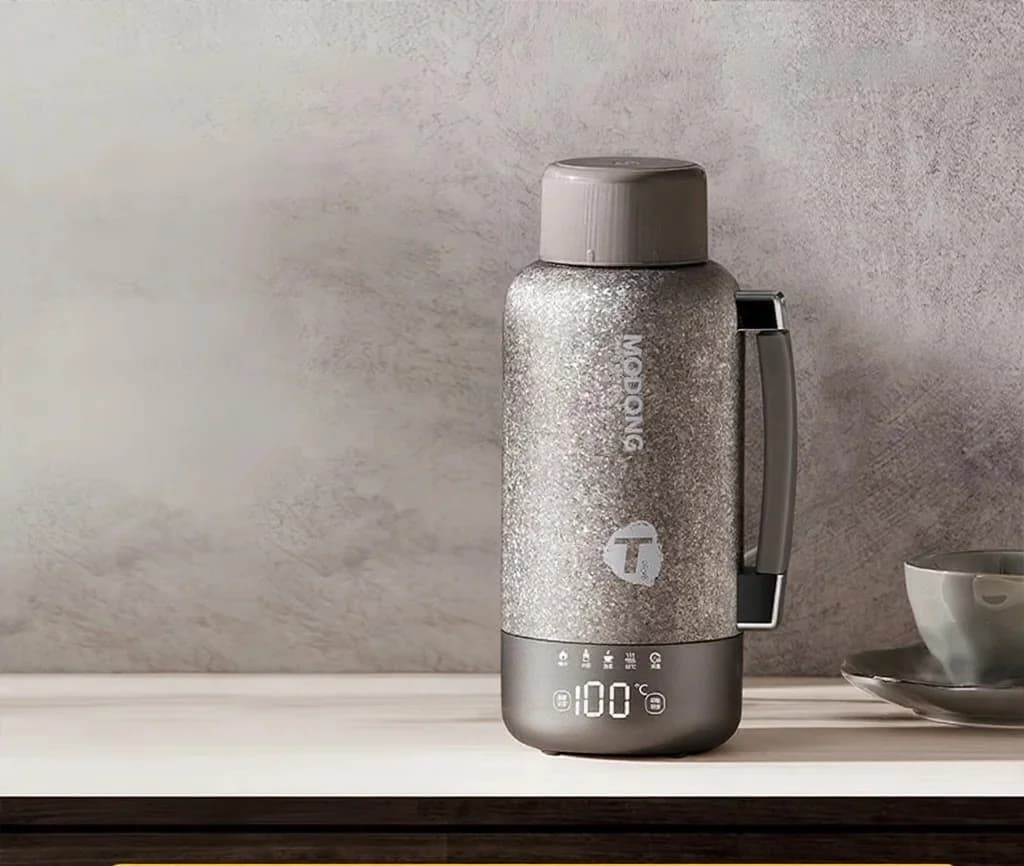 Ấm đun nước điện titanium di động 1L hai chế độ