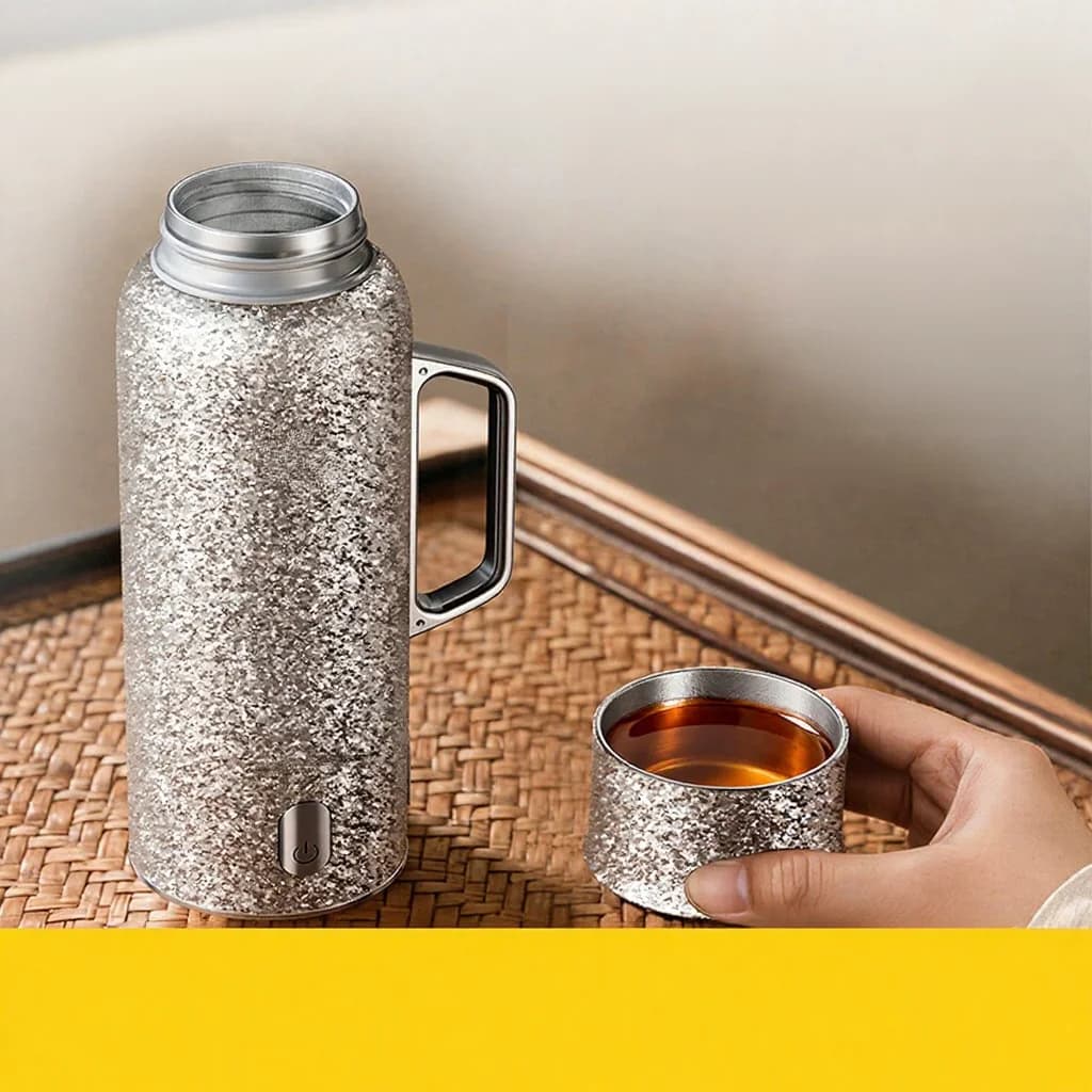 Cốc giữ nhiệt titanium có tay cầm 680ml hộp quà