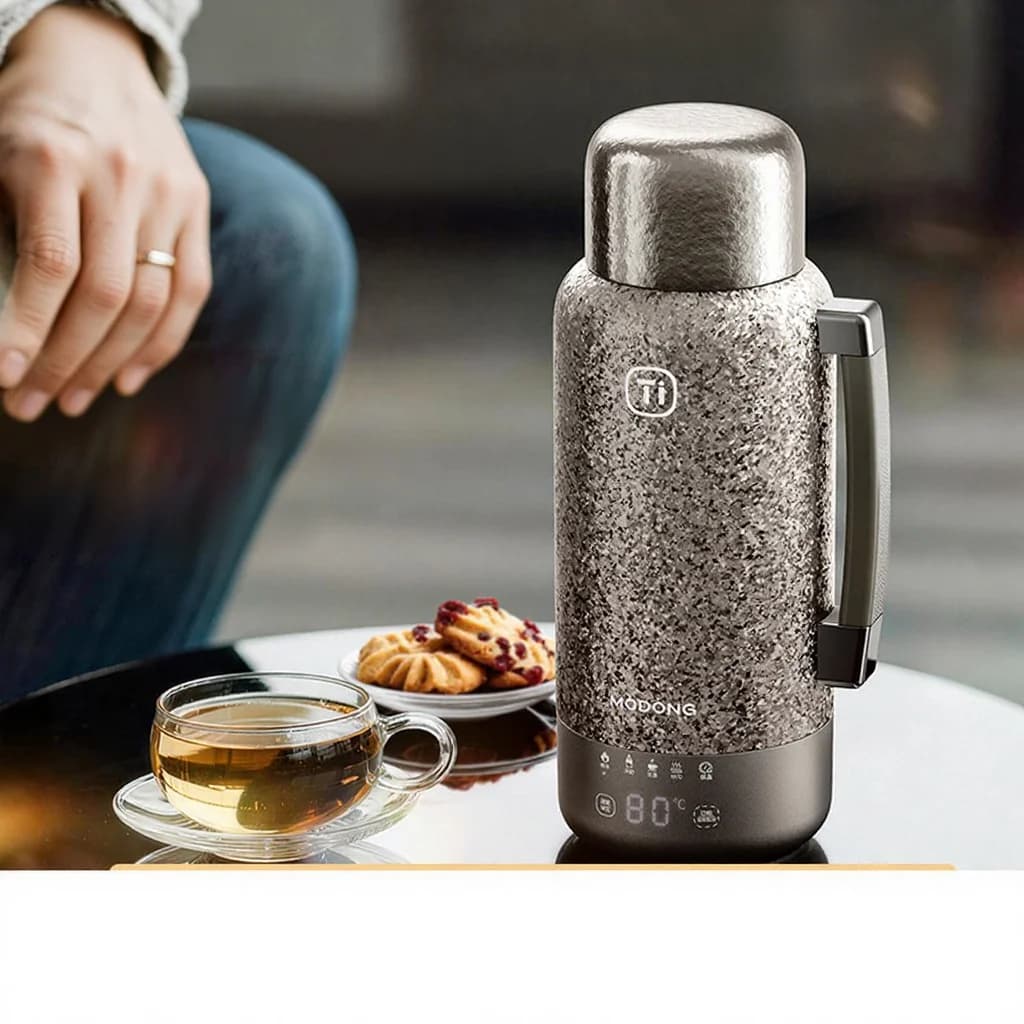 Cốc đun điện Titan nguyên chất có giữ nhiệt 1200ml